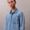 90-luvun tunnusmerkillä varustettu Denim-ylipaita 90-luvun tunnusmerkillä varustettu Denim-ylipaita