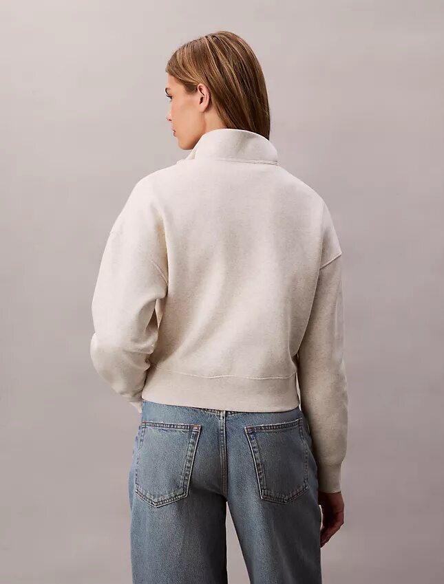 Arkistologolla varustettu fleece-paita, neljännesvetoketju ja korkea kaulus Arkistologolla varustettu fleece-paita, neljännesvetoketju ja korkea kaulus