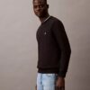 Arkistologolla varustettu fleece-pyöreäkaulainen collegepaita Arkistologolla varustettu fleece-pyöreäkaulainen collegepaita