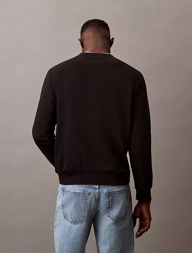 Arkistologolla varustettu fleece-pyöreäkaulainen collegepaita Arkistologolla varustettu fleece-pyöreäkaulainen collegepaita