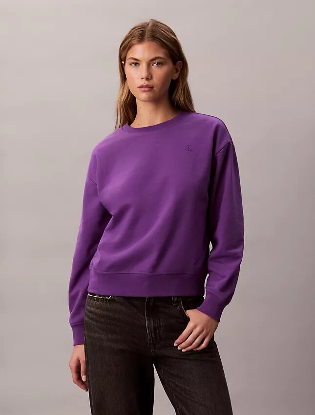 Arkistologolla varustettu rento fleece-huppari Arkistologolla varustettu rento fleece-huppari