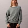 Arkistologolla varustettu rento fleece-huppari Arkistologolla varustettu rento fleece-huppari