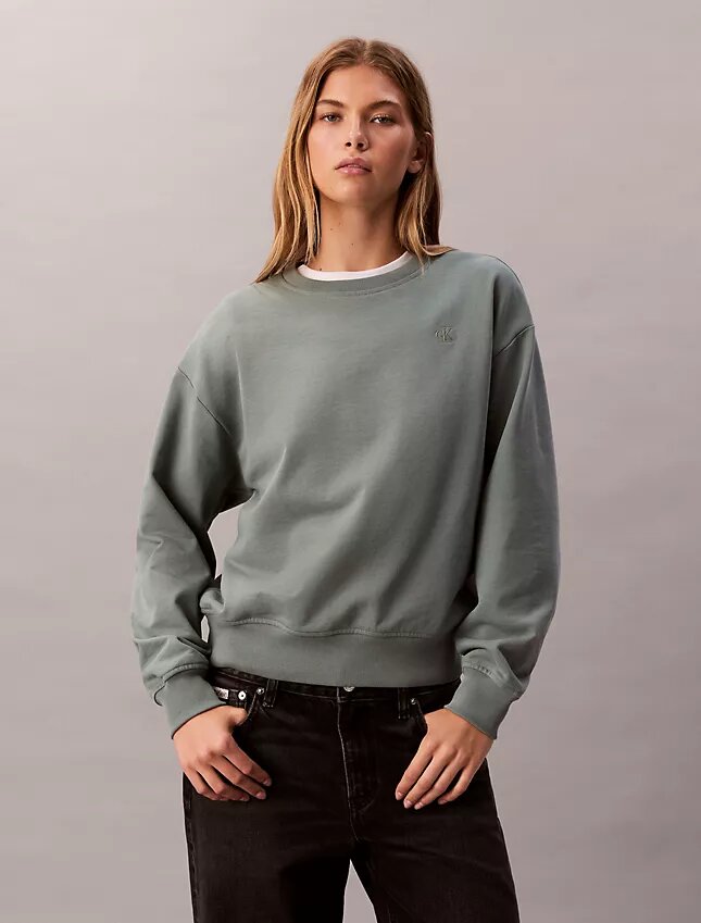 Arkistologolla varustettu rento fleece-huppari Arkistologolla varustettu rento fleece-huppari