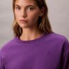 Arkistologolla varustettu rento fleece-huppari Arkistologolla varustettu rento fleece-huppari