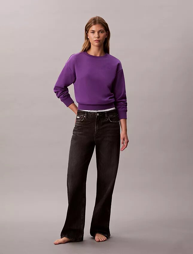 Arkistologolla varustettu rento fleece-huppari Arkistologolla varustettu rento fleece-huppari