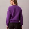 Arkistologolla varustettu rento fleece-huppari Arkistologolla varustettu rento fleece-huppari