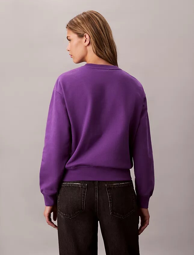 Arkistologolla varustettu rento fleece-huppari Arkistologolla varustettu rento fleece-huppari