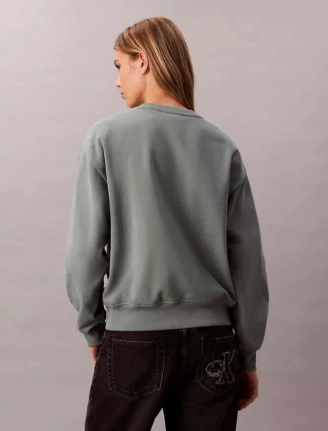 Arkistologolla varustettu rento fleece-huppari Arkistologolla varustettu rento fleece-huppari
