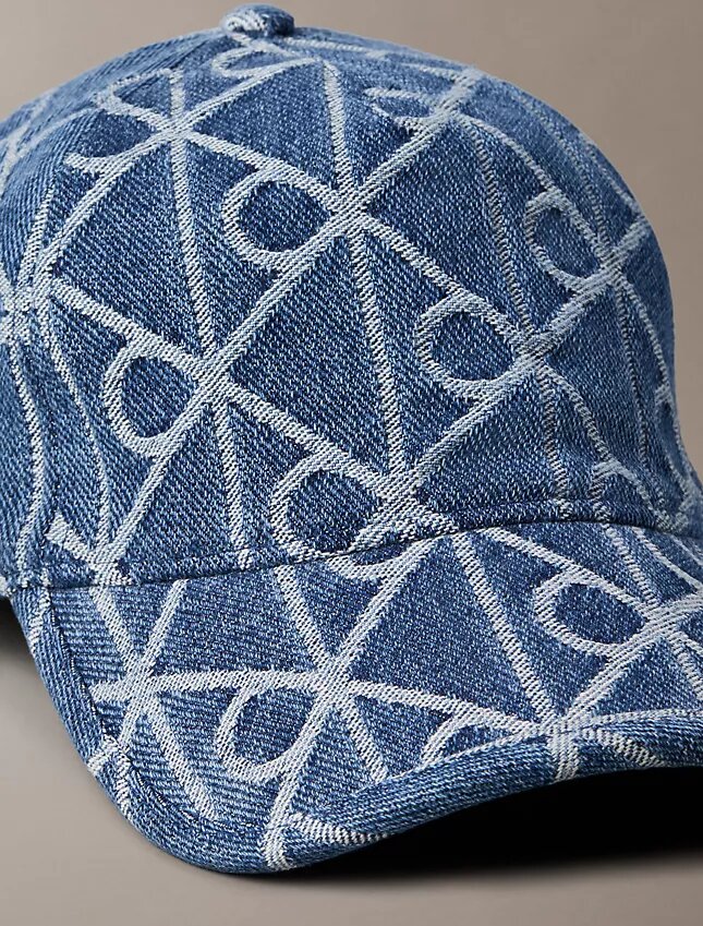 Denim-baseball-lippis, jossa on koko pinnan kattava logomerkki Denim-baseball-lippis, jossa on koko pinnan kattava logomerkki