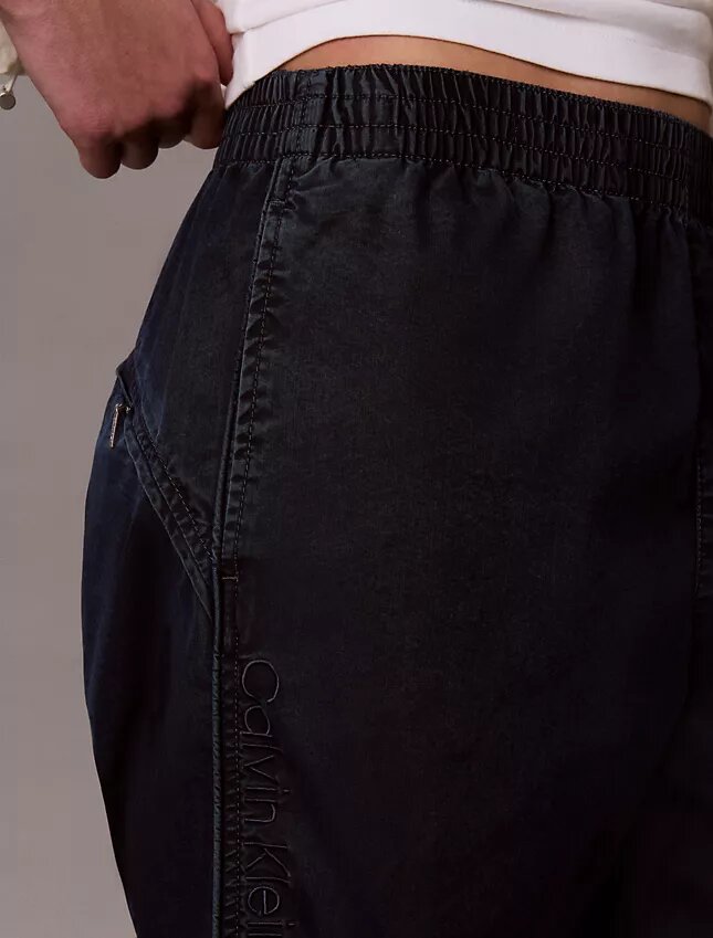Denim-laskuvarjohousut Denim-laskuvarjohousut