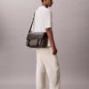 Emblem Jacquard -messenger-laukku Emblem Jacquard -messenger-laukku