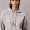 Fleece-paljettimonogrammin kanssa varustettu rento huppari Fleece-paljettimonogrammin kanssa varustettu rento huppari