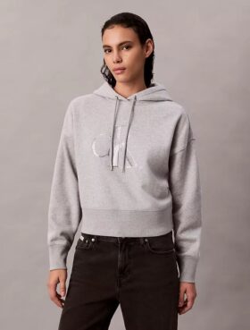 Fleece-paljettimonogrammin kanssa varustettu rento huppari