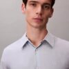 Geometrinen jacquard-kuvioinen slim-fit-paita napit edessä Geometrinen jacquard-kuvioinen slim-fit-paita napit edessä