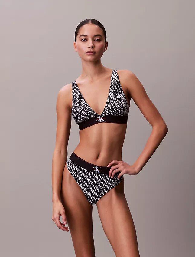 Graafinen monogrammi-Microfiber-kuituinen joustava, kevyesti vuorattu kolmiomallinen Bralette Graafinen monogrammi-Microfiber-kuituinen joustava, kevyesti vuorattu kolmiomallinen Bralette