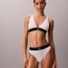 Graafinen monogrammi-Microfiber-kuituinen joustava, kevyesti vuorattu kolmiomallinen Bralette Graafinen monogrammi-Microfiber-kuituinen joustava, kevyesti vuorattu kolmiomallinen Bralette
