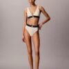 Graafinen monogrammi-Microfiber-kuituinen joustava, kevyesti vuorattu kolmiomallinen Bralette Graafinen monogrammi-Microfiber-kuituinen joustava, kevyesti vuorattu kolmiomallinen Bralette