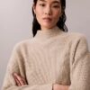 Hienoribbinen rento turtleneck-neule Hienoribbinen rento turtleneck-neule