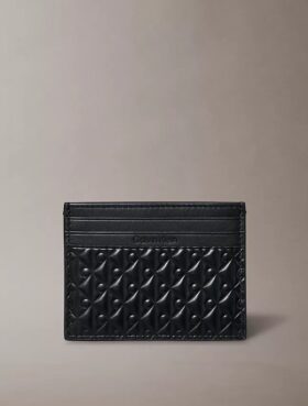 Koko pinnan kattava kohokuvioitu Monogram-korttikotelo Koko pinnan kattava kohokuvioitu Monogram-korttikotelo