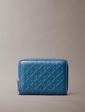 Koko pinnan kattava kohokuvioitu Monogram-kuvioinen vetoketjullinen kolikkopussi Koko pinnan kattava kohokuvioitu Monogram-kuvioinen vetoketjullinen kolikkopussi