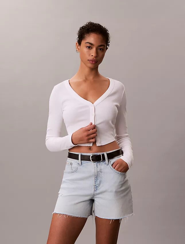 Korkeavyötäröiset midi-Denim-shortsit Korkeavyötäröiset midi-Denim-shortsit