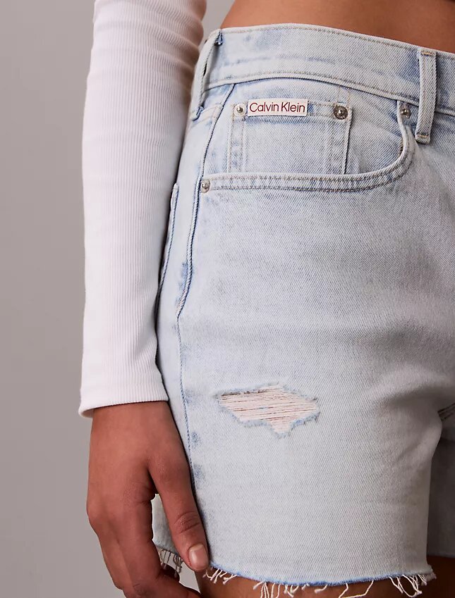 Korkeavyötäröiset midi-Denim-shortsit Korkeavyötäröiset midi-Denim-shortsit