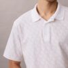 Liquid Touch -polo-paita, jossa on koko pinnan kattava painatus