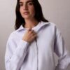 Logonauhalla varustettu vetoketjullinen collegepaita Logonauhalla varustettu vetoketjullinen collegepaita