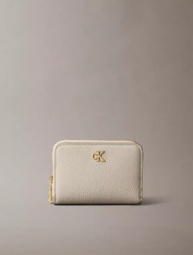 Minimalistinen Monogramilla varustettu vetoketjullinen lompakko