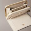 Minimalistinen Monogramilla varustettu vetoketjullinen lompakko Minimalistinen Monogramilla varustettu vetoketjullinen lompakko