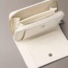 Minimalistinen Monogramilla varustettu vetoketjullinen lompakko Minimalistinen Monogramilla varustettu vetoketjullinen lompakko