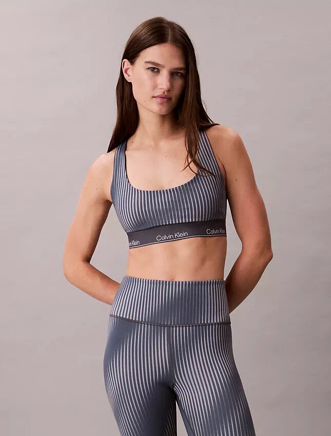 Moderni urheilullinen printti, racerback-malli, keskivahva urheiluliivi Moderni urheilullinen printti, racerback-malli, keskivahva urheiluliivi