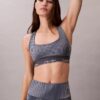 Moderni urheilullinen printti, racerback-malli, keskivahva urheiluliivi Moderni urheilullinen printti, racerback-malli, keskivahva urheiluliivi