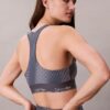 Moderni urheilullinen printti, racerback-malli, keskivahva urheiluliivi Moderni urheilullinen printti, racerback-malli, keskivahva urheiluliivi