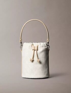 Monogram-kuvioinen bucket-laukku Monogram-kuvioinen bucket-laukku