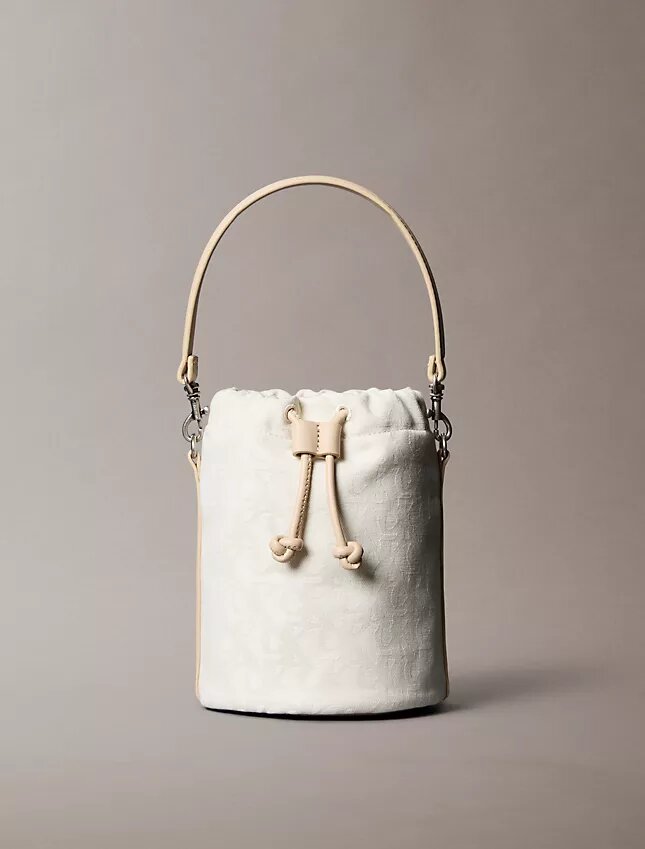 Monogram-kuvioinen bucket-laukku Monogram-kuvioinen bucket-laukku