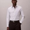 Raidallinen tekninen joustava slim-fit-paita napit edessä Raidallinen tekninen joustava slim-fit-paita napit edessä