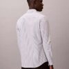 Raidallinen tekninen joustava slim-fit-paita napit edessä Raidallinen tekninen joustava slim-fit-paita napit edessä
